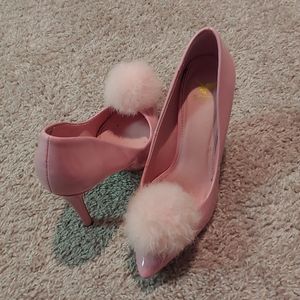 Light pink puff ball pumps